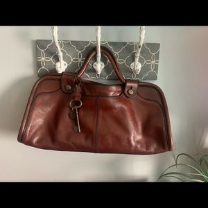 Fossil hand bag plus wallet.